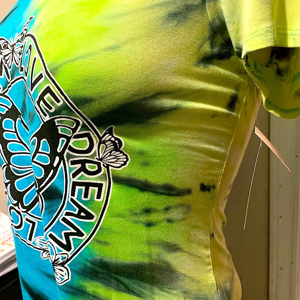 Colorful ladies top with logo in front